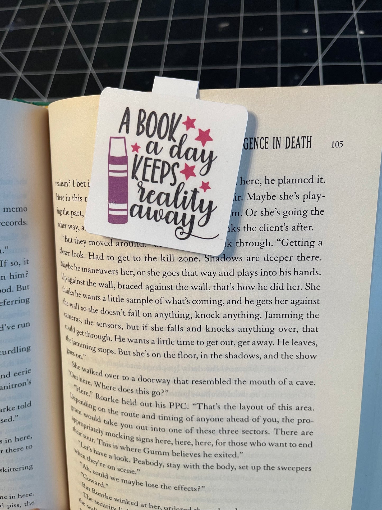 Magnetic Bookmark - A book a day keeps reality away.